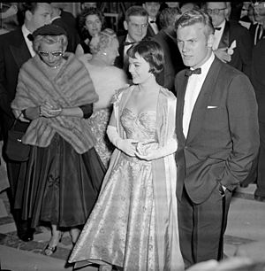 Natalie Wood and Tab Hunter arriving at the 28th Academy Awards 1956 cropped