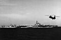USS Franklin D. Roosevelt (CVA-42) and USS Rigel (AF-58) underway at sea, circa in 1968 (NH 67911)
