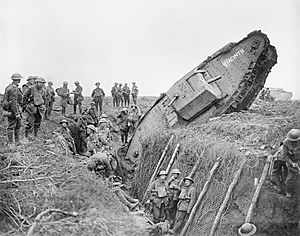 A Mark IV (Male) tank of 'H' Battalion, 'Hyacinth', ditched in a German trench while supporting 1st Battalion, Leicestershire Regiment near Ribecourt during the Battle of Cambrai, 20 November 1917. Q6432