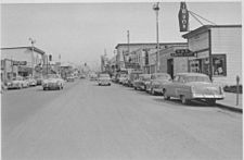 Fourth Avenue, which emerged as the early town's main east-west street, as it appeared in 1944 (left) and 1953 (right), both views looking east towards the Fourth Avenue Theatre and the Federal Building.