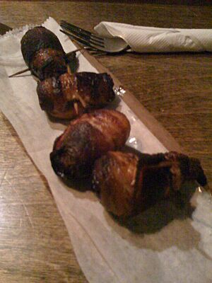 Bacon wrapped almond-stuffed dates