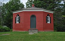 The Eight Square Schoolhouse, a red eight-sided one-room schoolhouse, in 2008