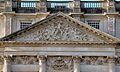 Hampton Court Palace, East front, Tympanum Relief, Hercules triumphing over Envy.jpg