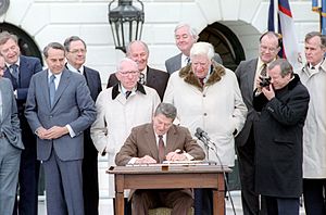 President Ronald Reagan Signing The Social Security Amendments Act of 1983