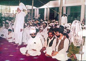Syed Ghulam Mohiyuddin Gilani alias Babuji presiding over an Urs cermony at Golra Sharif