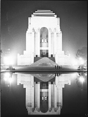 Coronation decorations, illuminations of Sydney, Anzac War Memorial, Hyde Park, Sydney, 1937 photographer, Sam Hood