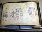 A photograph of an illustrated manuscript written in Greek. At the left are two people who are standing talking to a person who is seated, while 5 soldiers listen. At the right are a group of soldiers going somewhere.