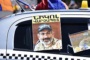 Nikol Pashinyan poster on car