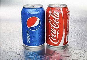 Pepsi-Cola and Coca-Cola cans