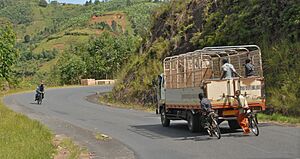Truck and bicylists near Gitega, Burundi