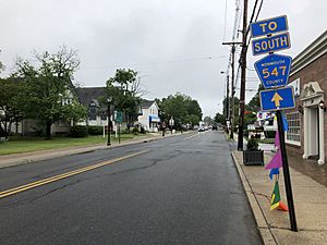 2018-05-27 15 54 32 View east along Monmouth County Route 524 and south along Monmouth County Route 547 (Main Street) at Asbury Avenue in Farmingdale, Monmouth County, New Jersey