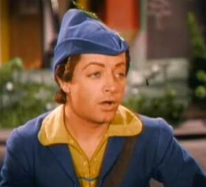 Colored photo of Felix Knight as Tom-Tom in "Babes in Toyland" (1934)