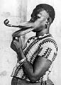 Extended mouthpiece for pipe smoking woman