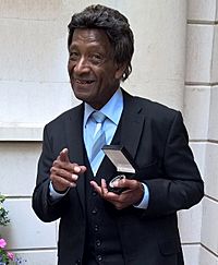 Frank Holder with his Life-Time Achievement Award from The Worshipful Company of Musicians