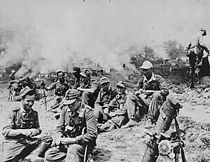 German soldiers relax after destroying a village in Epirus, Greece