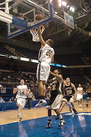 Joe Mazzulla playing basketball in the division l high school state championship game 2005