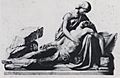 Neoclassical pieta of a woman holding a man's body in her lap.