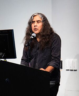 Raven Chacon in front of the audience at Columbia GSAPP Cropped.jpg