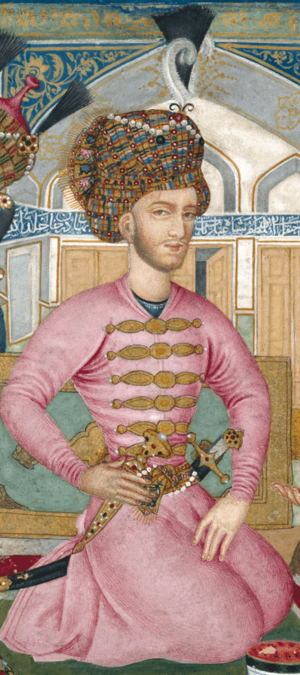 A painting of a sitted man, wearing a royal crown.