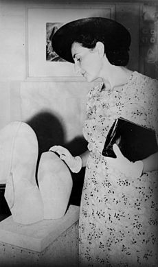 StateLibQld 1 192031 Viennese art critic Dr. Gertrude Langer inspecting a local art show, Brisbane, 1940