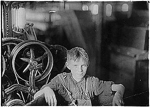 A Polish boy, Willie, who was taking his noon rest in a doffer box. Anthony, R.I, April 1909