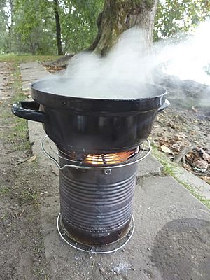 Cooking potatos on a large hobo stove 04