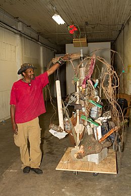 Lonnie Holley with sculpture