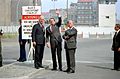 President Ronald Reagan waves and stands with Chancellor Helmut Schmidt and Berlin Mayor Richard von Weizsacker