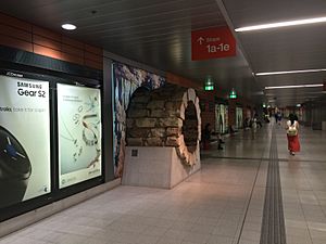 Segment of the Wheat Creek Culvert on display in the King George Square busway station, 2015