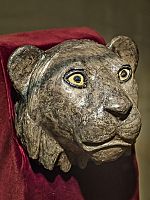 Silver Lion's Head Finial for the arm of a chair with shell and lapis lazuli inset eyes recovered from the royal cemetery of Ur 2550-2450 BCE