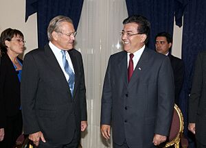 The President of Paraguay (PRY), Duarte Frutos (right), greets The Honorable Donald H. Rumsfeld, Secretary of Defense, upon his arrival on Aug. 16, 2005, at Asuncion, Paraguay. Secr - DPLA - bcf1d46960f0dc360b566638dd212269