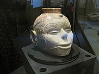 Vessel resembling a human head on display at the museum
