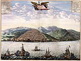 Ships in harbor before a walled and built-up city ascending a steep hill behind a citadel at the water's edge