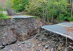 Deep gorge created in road after Hurricane Irene flooding, Oliverea, NY
