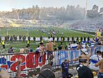 Festejos de jugadores e hinchas de Universidad Católica tras la obtención del tetracampeonato 2018-2021