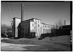 General view of stone mill building - Norfolk Manufacturing Company Cotton Mill, 90 Milton Street, Dedham, Norfolk County, MA