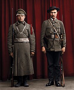 Two Red Guards photographed in Atelier Nyblin, Kaisaniemenkatu 3 A, Helsinki, Finland, 8 April 1918. Colorized by Julius Jääskeläinen
