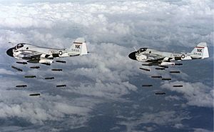 A-6A Intruders of VA-196 dropping Mk 82 bombs over Vietnam on 20 December 1968 (NNAM.1996.253.7047.013)