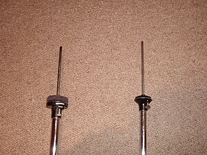 Hi-hat stand tilt mechanisms