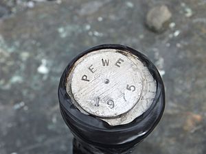 Marker labeled PEWE 1975 located near Gulkana Glacier in Alaska, USA
