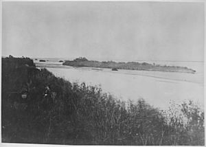 Missouri River near Omaha Indian Agency. Mrs. W.H. Jackson in foreground. - NARA - 516607