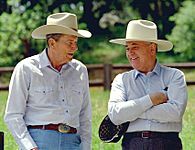 Reagan and Gorbachev relaxing at Rancho del Cielo in May 1992. Reagan gave Gorbachev a white cowboy hat, which he wore backwards.
