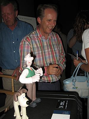 Wallace, Gromit, and creator Nick Park