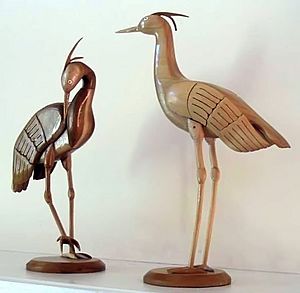 Woodcarvings of cranes
