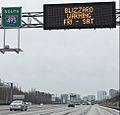 2016-01-22 10 06 42 Variable message signs reading 'Blizzard Warning - Fri-Sat' on the southbound outer loop of the Capital Beltway (Interstate 495) in McLean, Fairfax County, Virginia-cropped