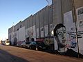 Bethlehem wall graffiti Mandela, Sanders, Trump, Zuckerberg