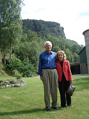 Gene and Marian Amdahl in front of the "Amdahl troll"