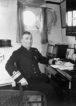 Admiral Burnett in his cabin 1943 IWM A 12758
