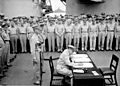 Douglas MacArthur signs formal surrender