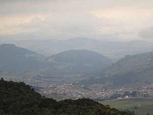 La Calera viewed from a mountain to the west, just before a storm